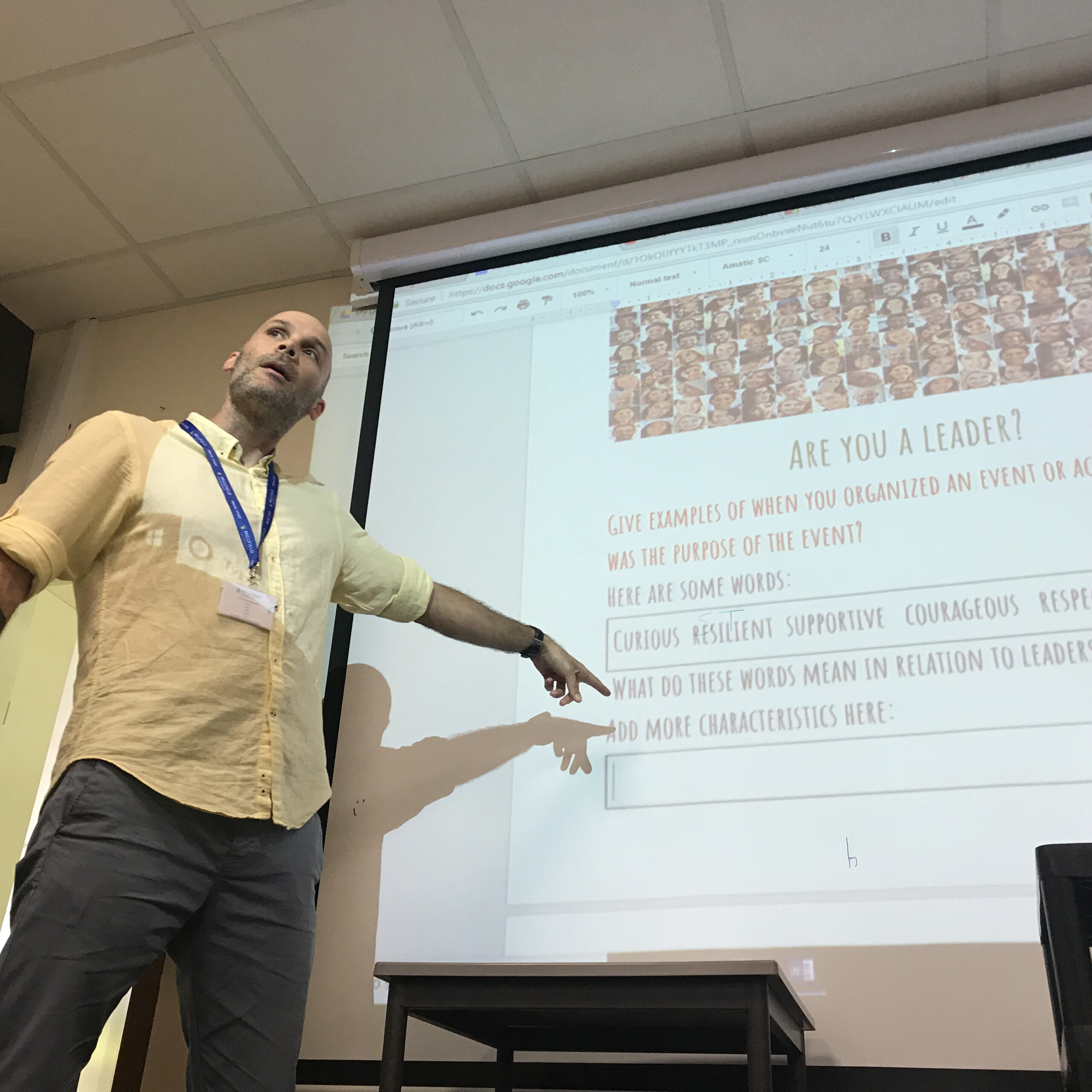 Nondas Pettas teaching a class of teenagers